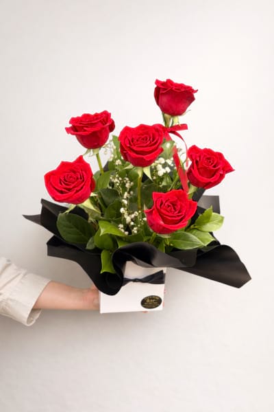 Half dozen red rose box arrangement